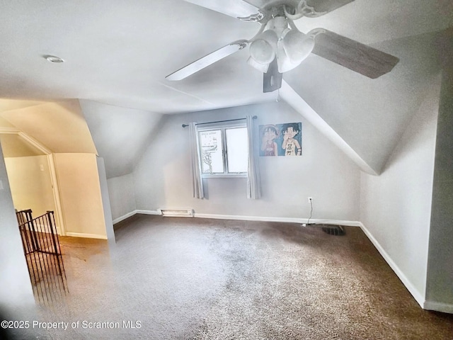 bonus room featuring lofted ceiling, a baseboard heating unit, carpet floors, and ceiling fan