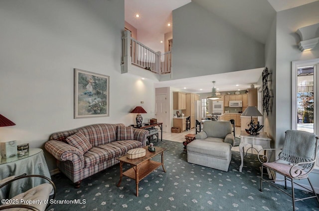 living room with a towering ceiling