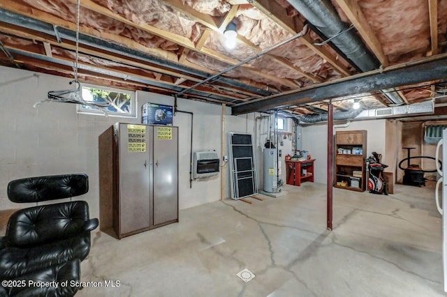 below grade area featuring gas water heater and heating unit