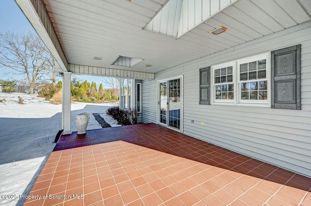 view of snow covered patio