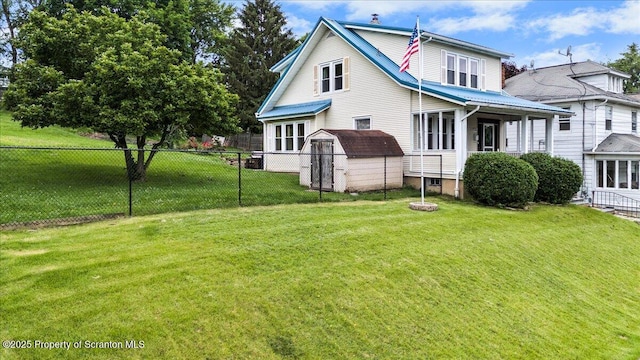 820 Cherry St, Scranton, PA 18505 - back of house featuring a storage shed and a fenced backyard