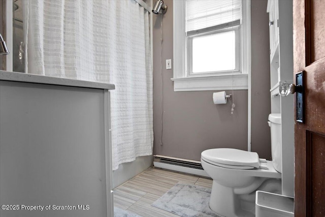 820 Cherry St, Scranton, PA 18505 - bathroom with a baseboard radiator and toilet