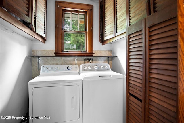 820 Cherry St, Scranton, PA 18505 - laundry room featuring cabinet space and washing machine and clothes dryer