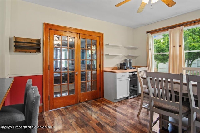 820 Cherry St, Scranton, PA 18505 - dining space featuring wine cooler, dark wood-type flooring, french doors, and a ceiling fan