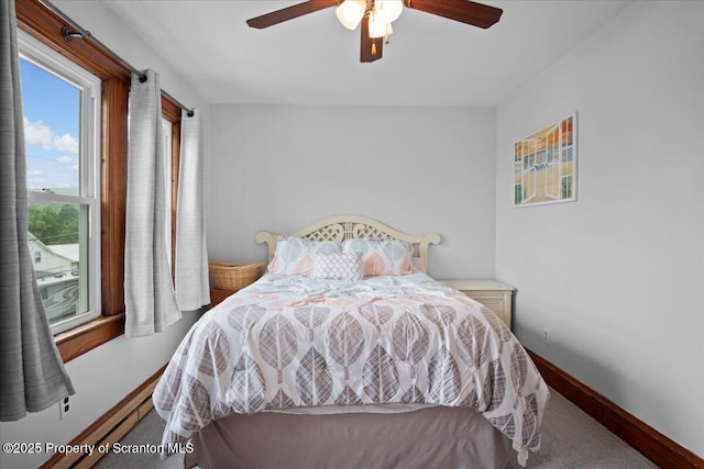 820 Cherry St, Scranton, PA 18505 - carpeted bedroom with baseboards and ceiling fan