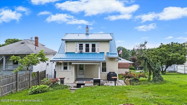 820 Cherry St, Scranton, PA 18505 - back of property with a metal roof and a chimney