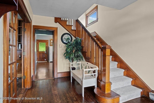 820 Cherry St, Scranton, PA 18505 - staircase featuring wood finished floors and baseboards