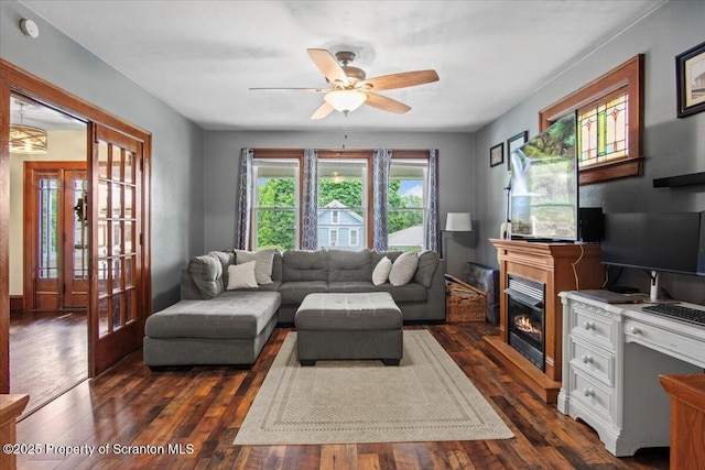 820 Cherry St, Scranton, PA 18505 - living area featuring a ceiling fan, dark wood finished floors, and a glass covered fireplace