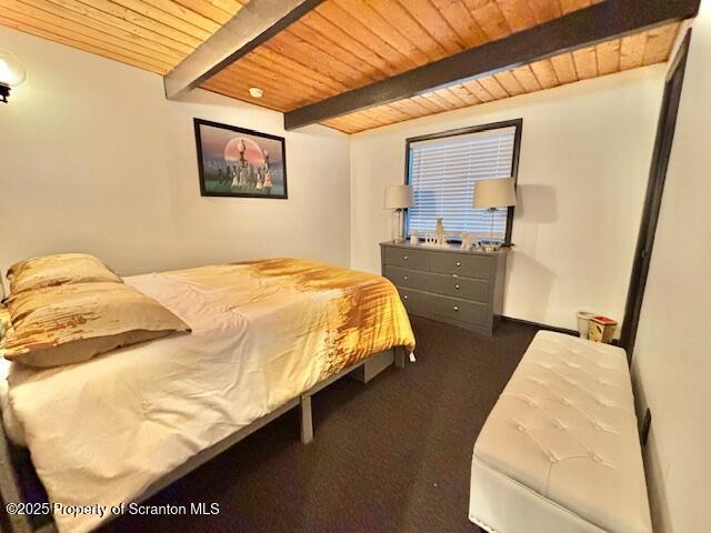 1717 Rolling Hills Dr, Tobyhanna, PA 18466 - carpeted bedroom with a wood ceiling with exposed beams