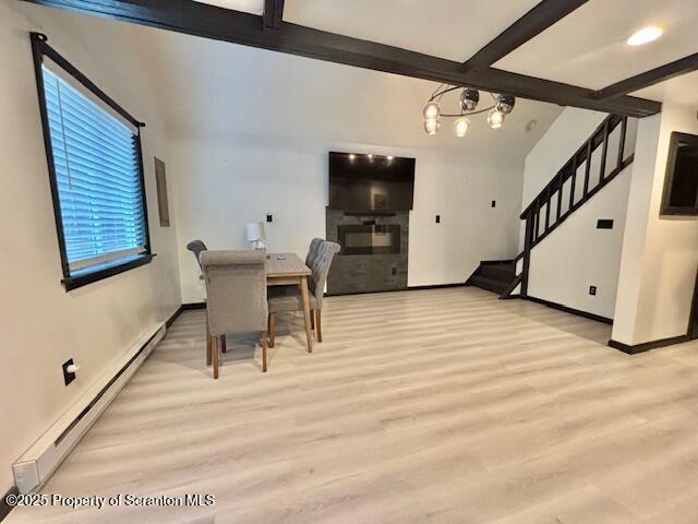 1717 Rolling Hills Dr, Tobyhanna, PA 18466 - dining room featuring baseboard heating, beam ceiling, light wood-style floors, stairway, and a chandelier