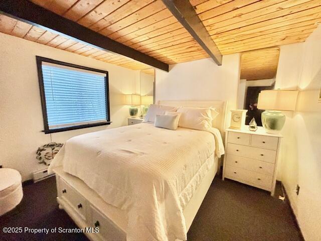 1717 Rolling Hills Dr, Tobyhanna, PA 18466 - bedroom featuring a wooden ceiling with exposed beams and dark colored carpet