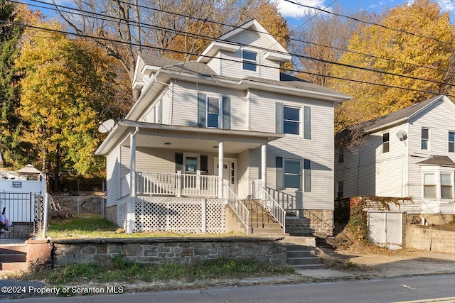 view of property with a porch