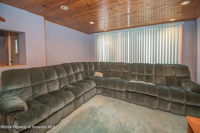 carpeted living room with wooden ceiling