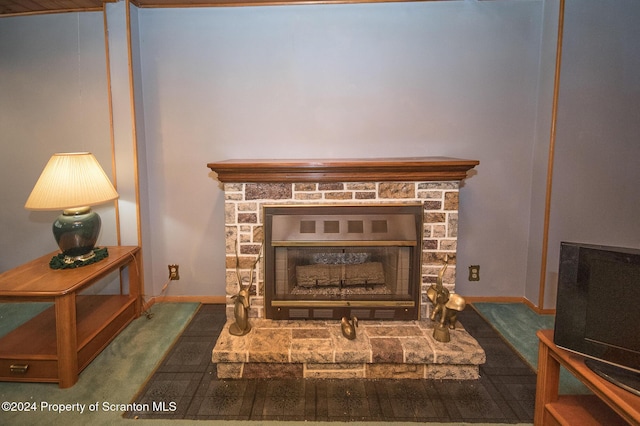 details with a stone fireplace