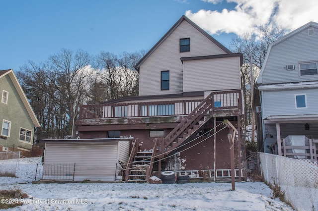 view of snow covered house