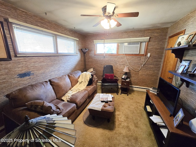 living room featuring a baseboard radiator, ceiling fan, and carpet flooring