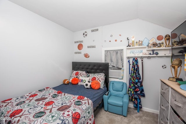 bedroom featuring carpet and lofted ceiling