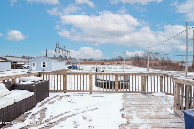 view of snow covered deck