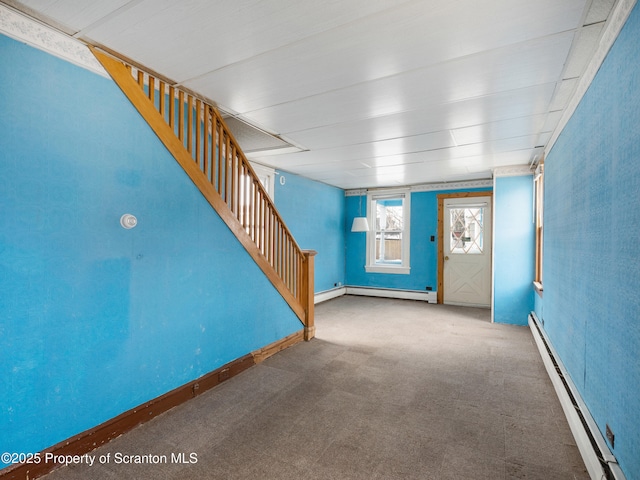 interior space with a baseboard radiator and carpet floors