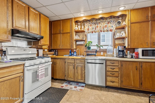 934 W Market St, Scranton, PA 18508 - kitchen featuring white appliances, open shelves, under cabinet range hood, a paneled ceiling, and light countertops