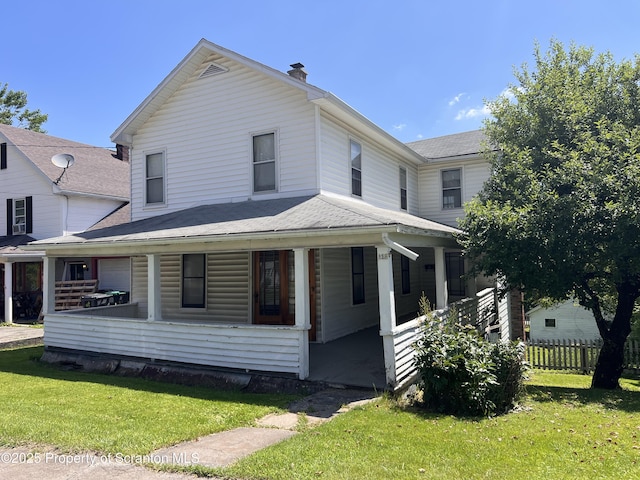 826 N Main St, Forest City, PA 18421 - view of front of house with covered porch and a chimney