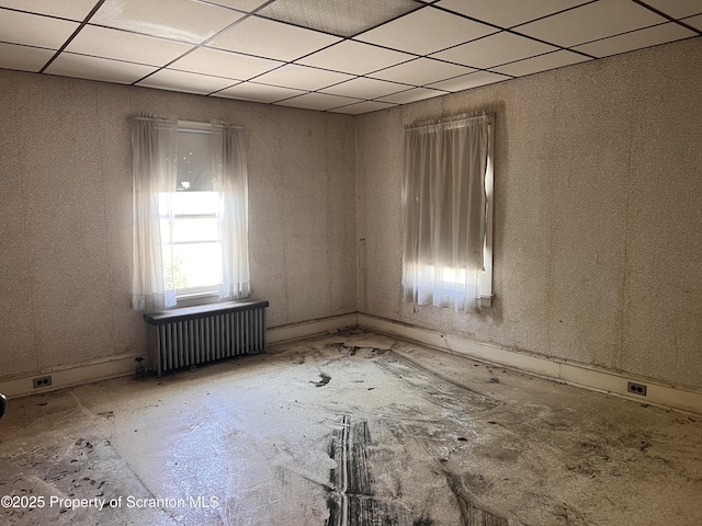826 N Main St, Forest City, PA 18421 - spare room with radiator and a drop ceiling