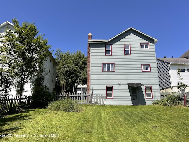 826 N Main St, Forest City, PA 18421 - rear view of house with a chimney