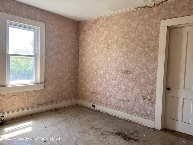 826 N Main St, Forest City, PA 18421 - unfurnished room with plenty of natural light and wallpapered walls