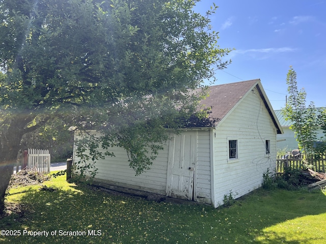 826 N Main St, Forest City, PA 18421 - view of property exterior featuring an outbuilding and a shingled roof