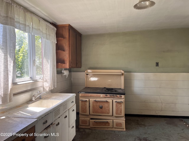 826 N Main St, Forest City, PA 18421 - kitchen with concrete flooring, light countertops, and white cabinetry