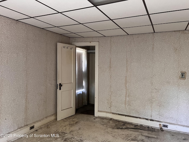 826 N Main St, Forest City, PA 18421 - spare room with a paneled ceiling and concrete flooring