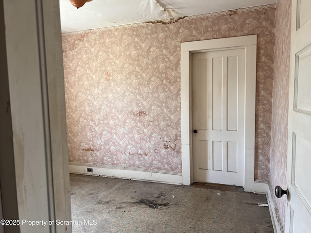 826 N Main St, Forest City, PA 18421 - empty room featuring wallpapered walls
