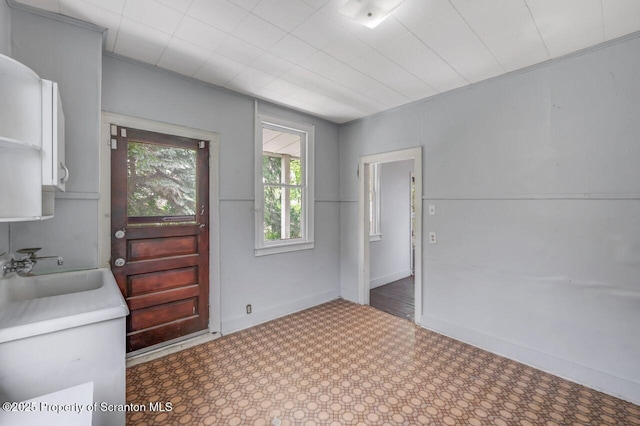1725 Cedar Ave, Scranton, PA 18505 - unfurnished dining area with a sink and baseboards