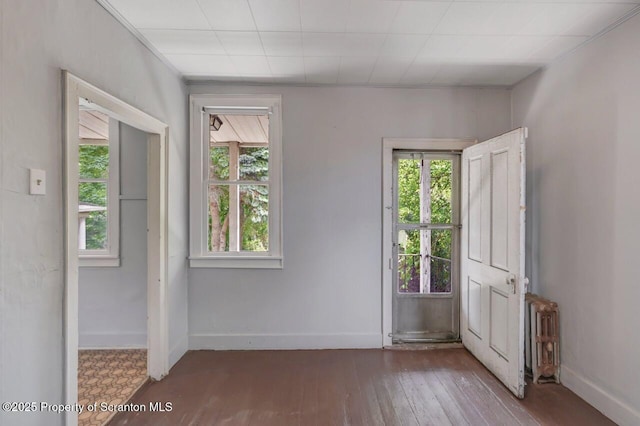 1725 Cedar Ave, Scranton, PA 18505 - foyer entrance featuring hardwood / wood-style flooring and radiator heating unit