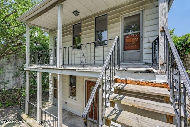 1725 Cedar Ave, Scranton, PA 18505 - view of exterior entry featuring a porch and a balcony