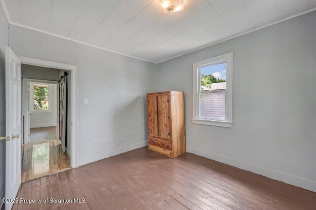 1725 Cedar Ave, Scranton, PA 18505 - unfurnished room with crown molding and hardwood / wood-style flooring