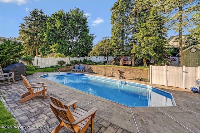 1107 Richmont St, Scranton, PA 18509 - view of swimming pool with a grill, a patio, and a fenced backyard