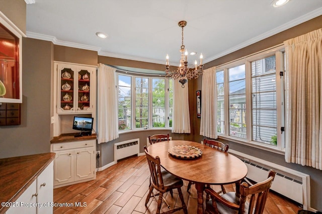 1107 Richmont St, Scranton, PA 18509 - dining area featuring radiator, a chandelier, a baseboard heating unit, light wood-style floors, and recessed lighting