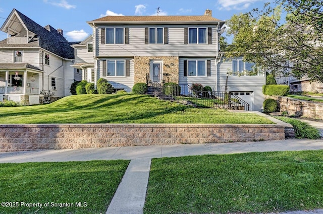 1107 Richmont St, Scranton, PA 18509 - view of front of house featuring a chimney, an attached garage, and a front yard