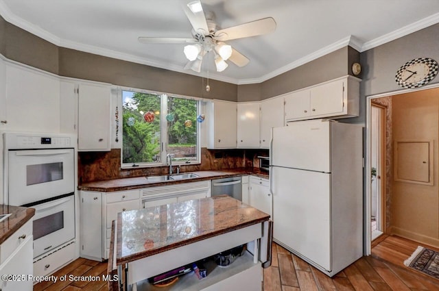1107 Richmont St, Scranton, PA 18509 - kitchen featuring white appliances, a sink, light wood-type flooring, white cabinets, and crown molding