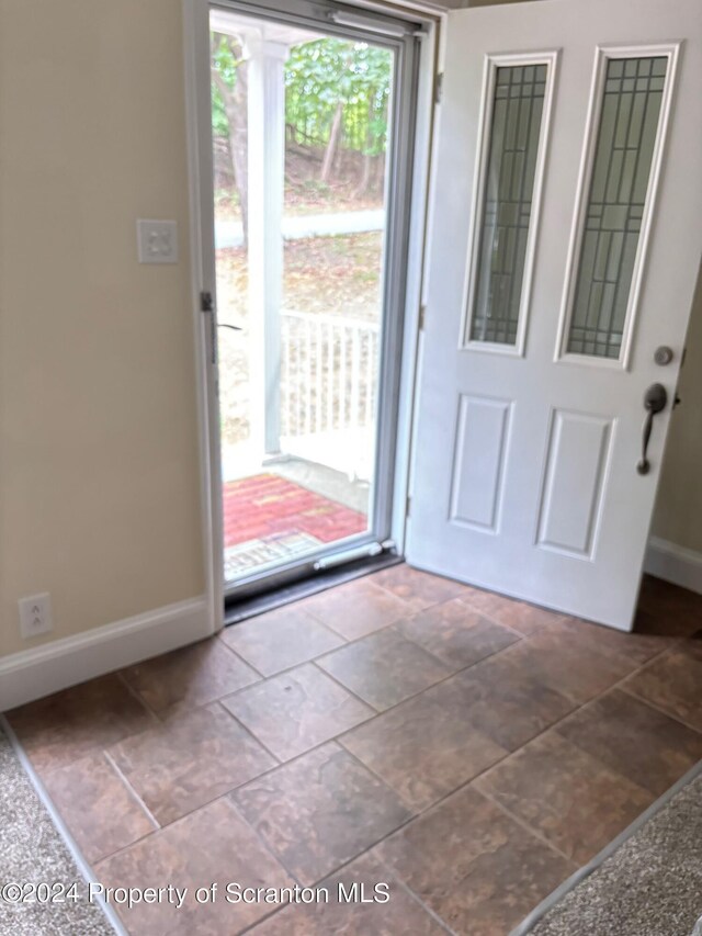 doorway with baseboards