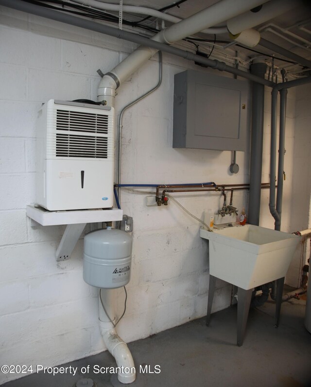 utility room featuring a sink