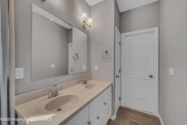 98 Electric St Unit L 1, Clarks Summit, PA 18411 - bathroom with double vanity and tile patterned floors