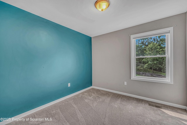 98 Electric St Unit L 1, Clarks Summit, PA 18411 - carpeted spare room featuring baseboards