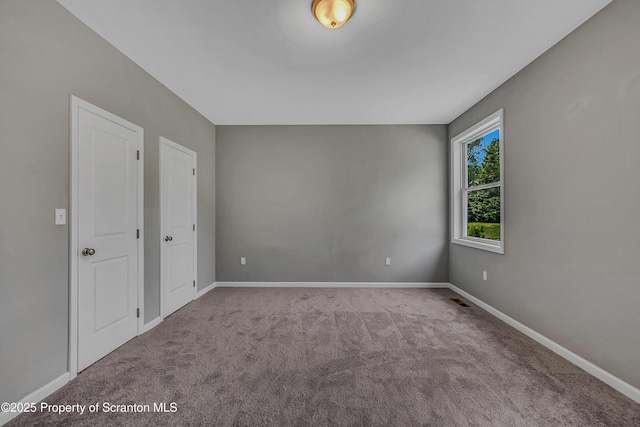 98 Electric St Unit L 1, Clarks Summit, PA 18411 - spare room with carpet flooring and baseboards