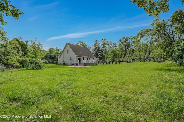 98 Electric St Unit L 1, Clarks Summit, PA 18411 - view of green lawn with a wooden deck