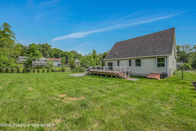 98 Electric St Unit L 1, Clarks Summit, PA 18411 - rear view of house featuring a deck and roof with shingles