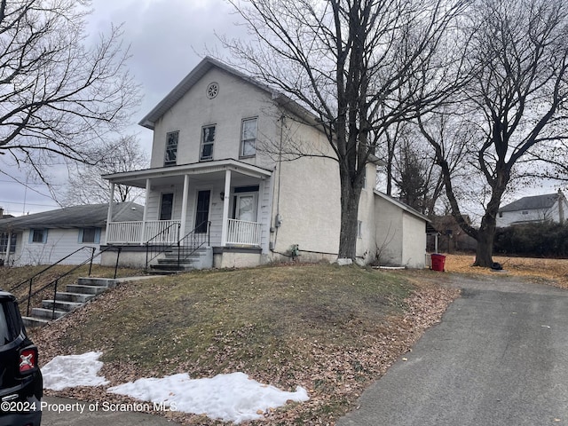 view of front facade with covered porch