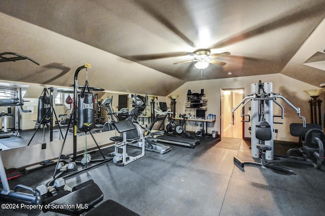 workout area with ceiling fan and lofted ceiling