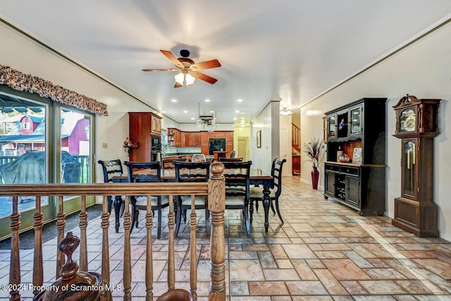 dining space featuring ceiling fan